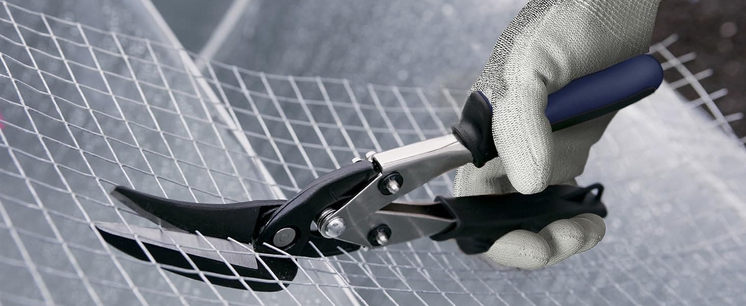 Person wearing gloves holding a pair of pliers on a tiled floor