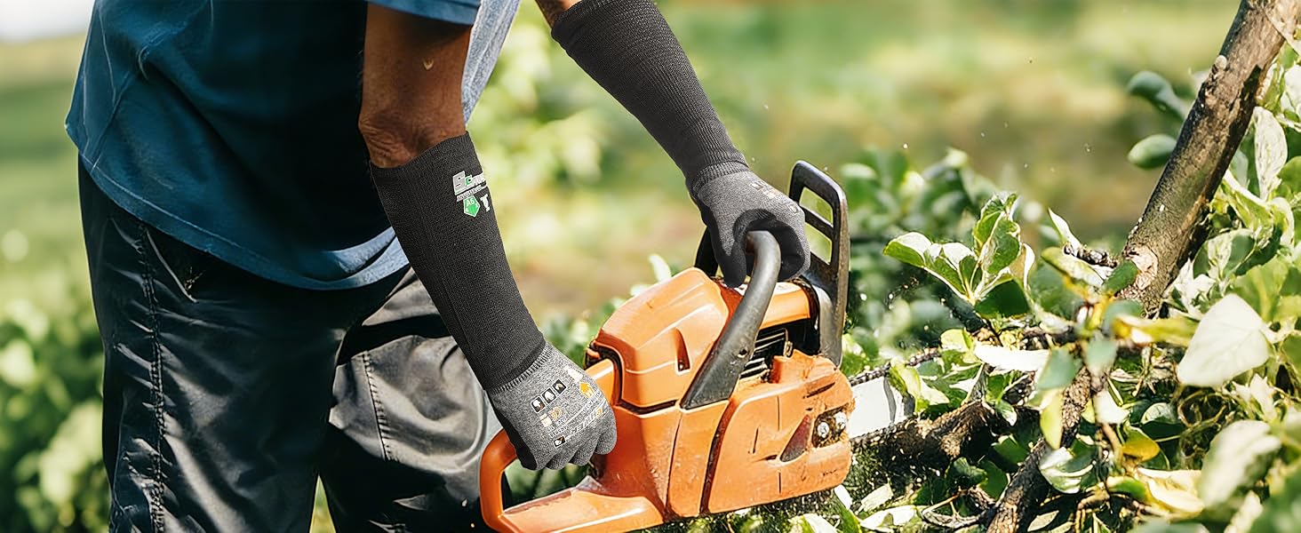Person using a chainsaw to trim bushes in an outdoor setting
