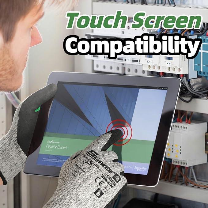 Cut resistant gloves used on tablet touchscreen in industrial electrical setting.