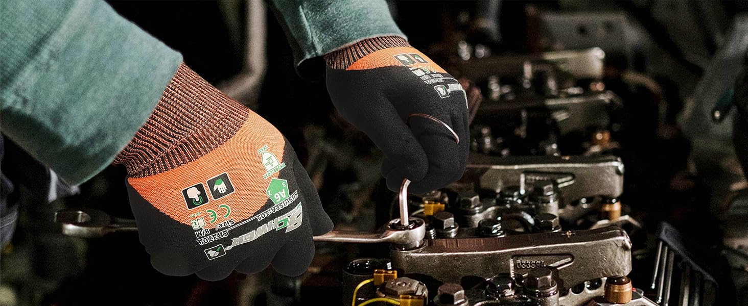 Person wearing gloves working on a mechanical engine