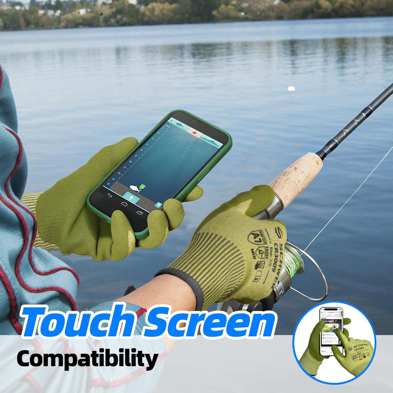 Person wearing green cut resistant gloves using a touchscreen smartphone while fishing by a lake