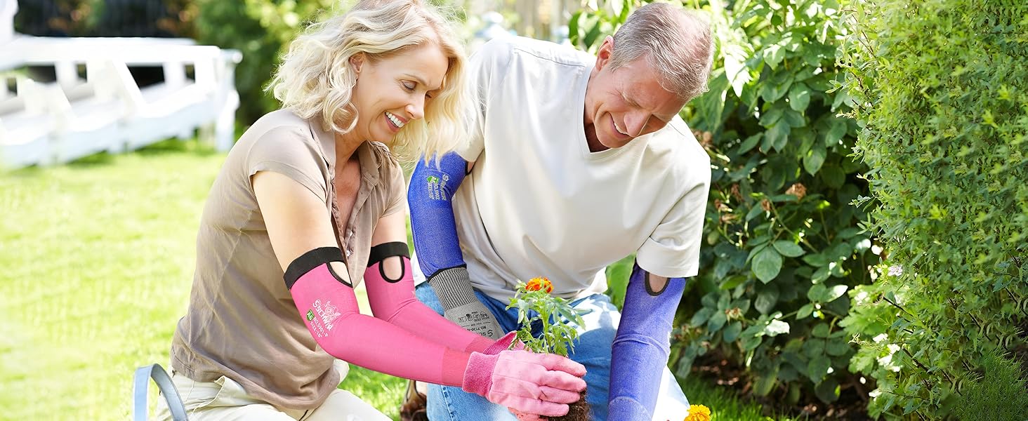 Two people gardening together, one using a blue arm brace and pink gloves, the other with a white shirt and blue gloves.