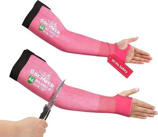 Pink arm sleeves with black ends and visible branding, being cut open with scissors on a white background.