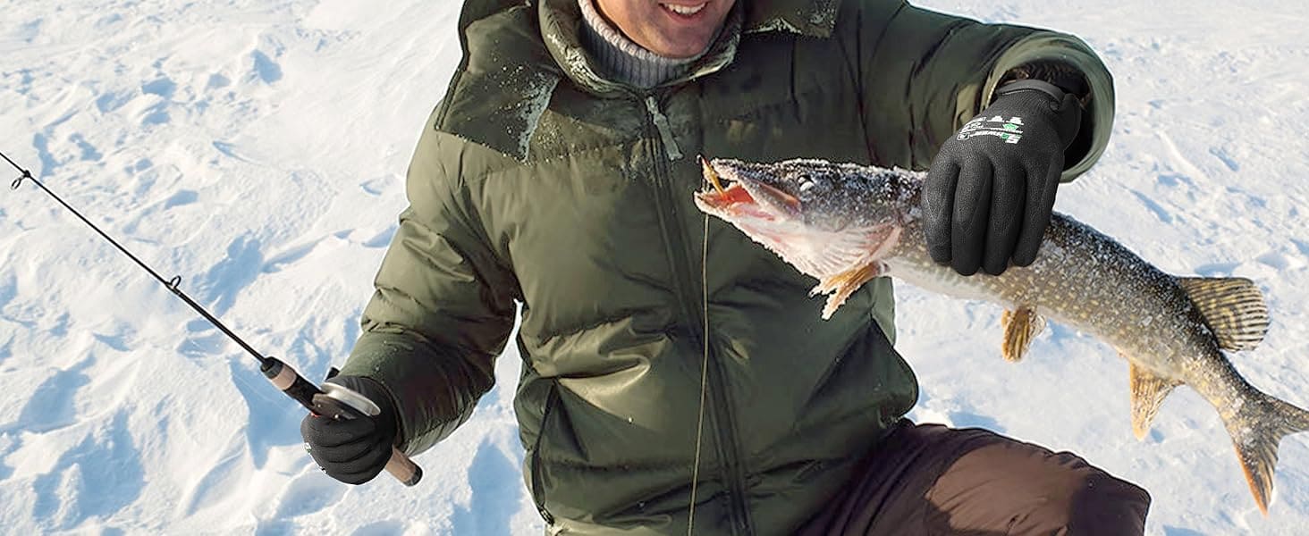 Person holding a fish caught from ice fishing on a snowy background