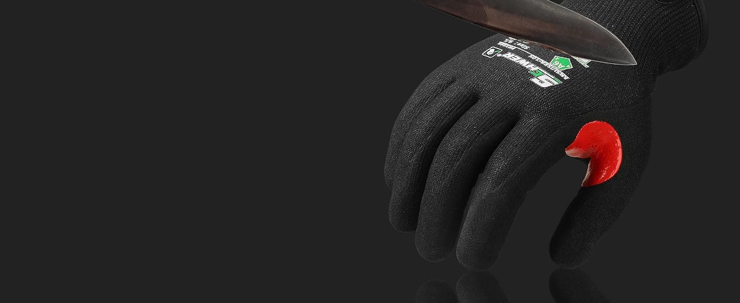 Black gardening glove with red accents on a black background