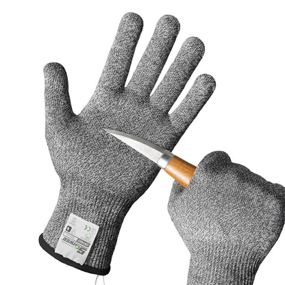 Gray cut-resistant gloves with a knife on a white background
