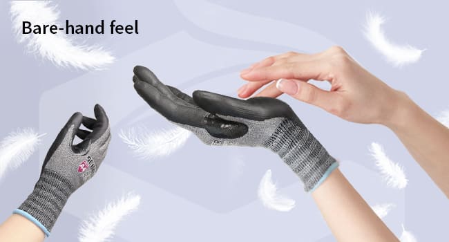 Person wearing black gloves with cut-resistant material on a light gray background