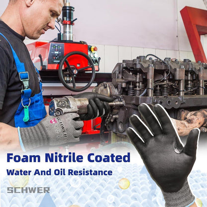 Mechanic using foam nitrile coated gloves for water and oil resistant protection while repairing engine