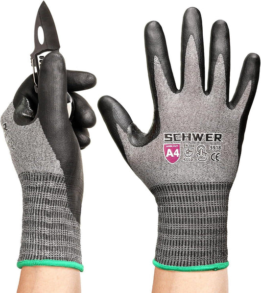 Pair of Schwer ANSI A4 cut-resistant work gloves with black grip, shown on hands, one holding a folding knife