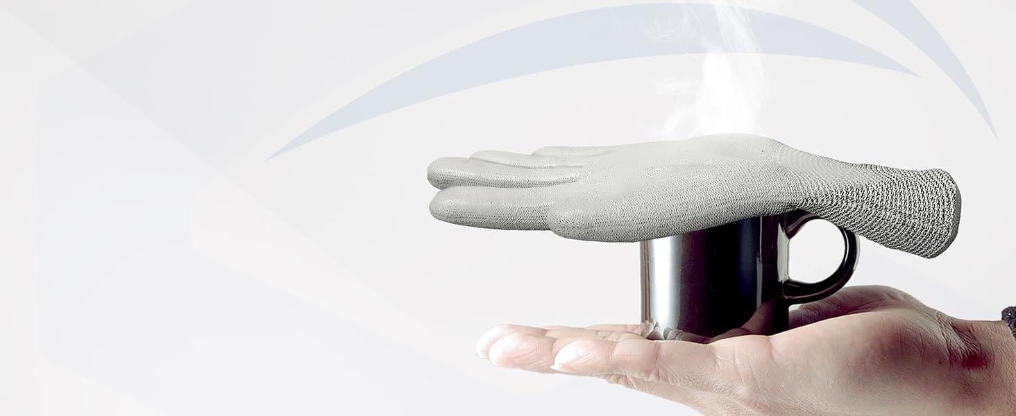 Hand holding a black mug with a white glove on top against a light gray background