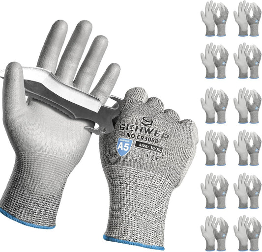 Pair of Schwer cut resistant work gloves with ANSI A5 rating holding a metal knife blade against white background
