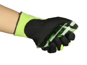 Black and green gardening gloves on a white background