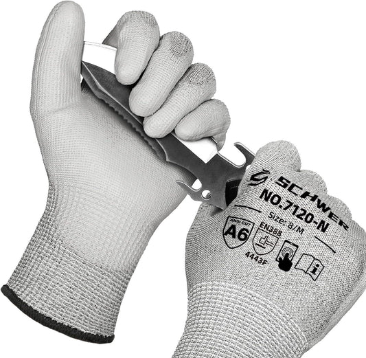 Pair of gray Schwer cut-resistant work gloves holding a serrated-edge knife, size 8/M, ANSI A6 rated