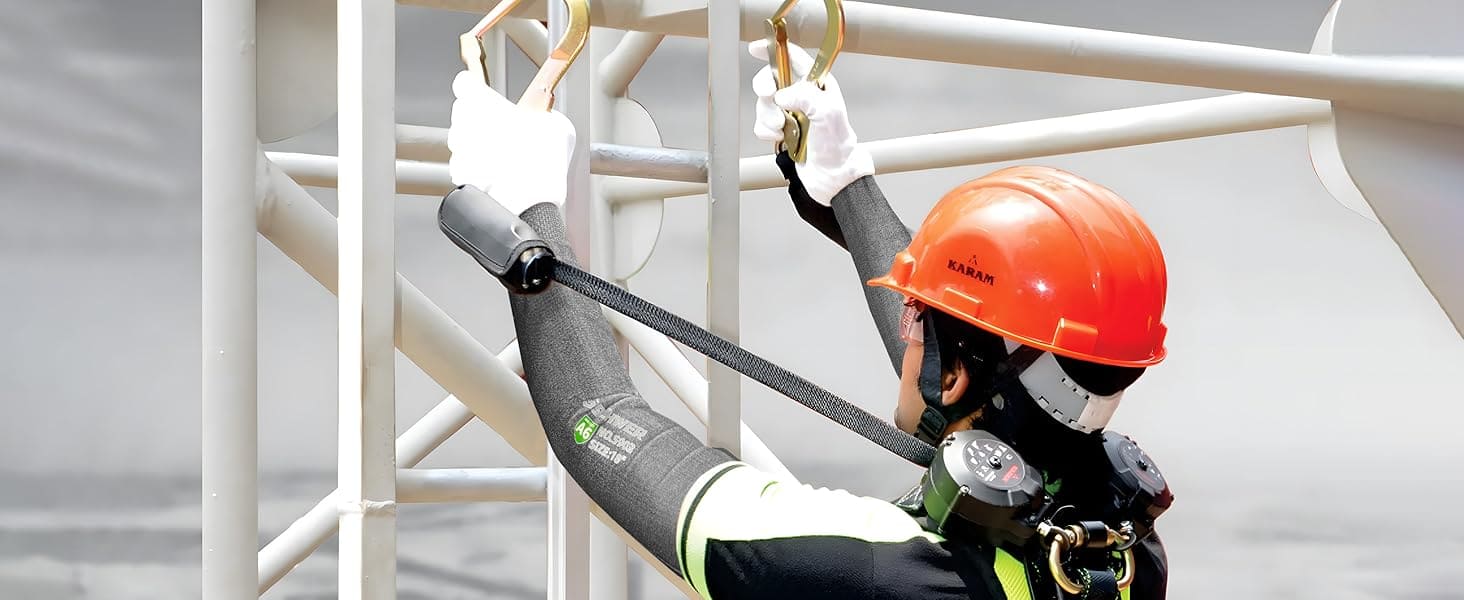 Person in safety gear working on a metal structure