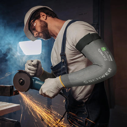 Person wearing a Schwer sleeve while using a grinder with sparks flying.