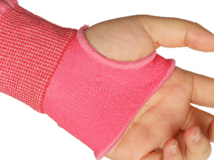 Pink wrist support brace on a white background