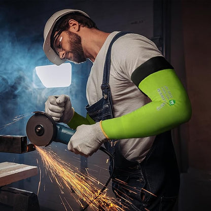 Worker wearing safety helmet, protective gloves, and green cut resistant arm sleeves using an angle grinder with sparks flying