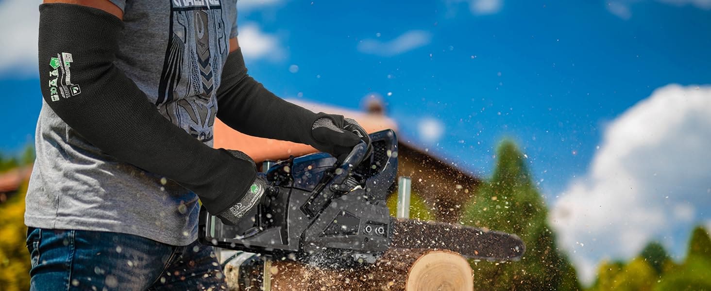 Person using a chainsaw with a clear blue sky and house in the background