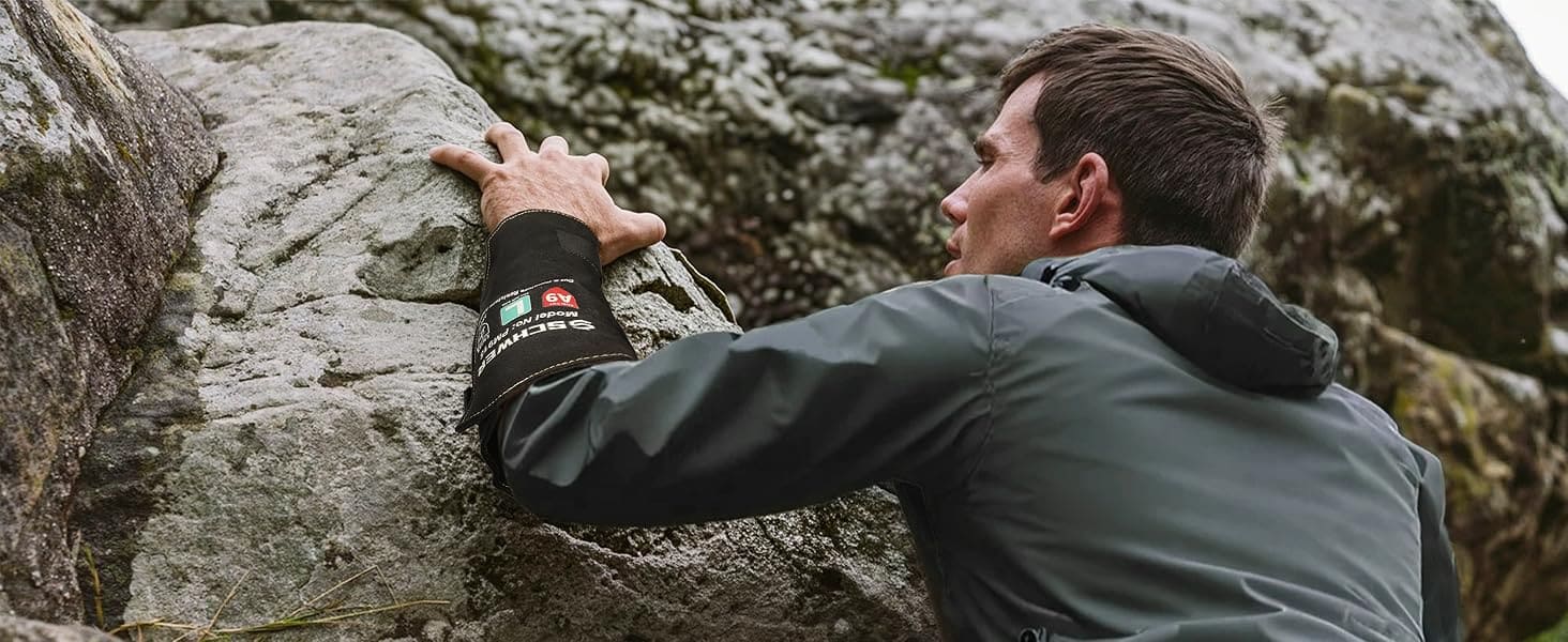 Person climbing a rocky mountain