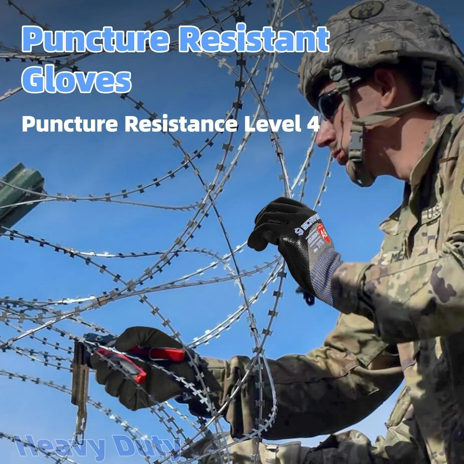 Soldier wearing puncture resistant gloves handling razor wire with cutters against blue sky