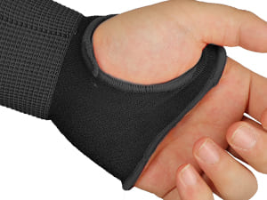 Black wrist support brace on a person's wrist