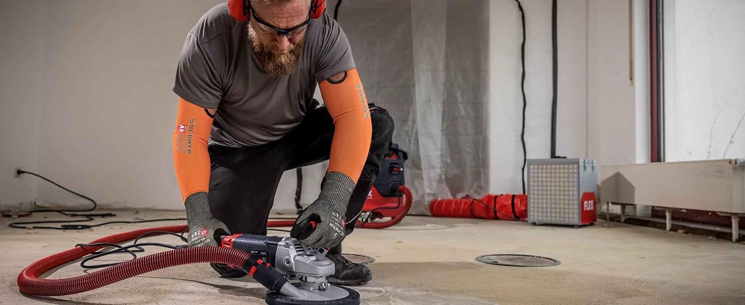 Person using a floor polisher in an indoor setting