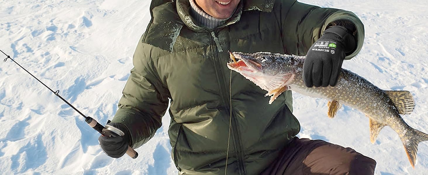 Person holding a fish caught from ice fishing on a snowy background