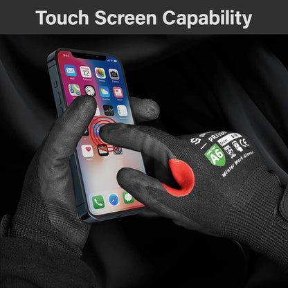 Black winter work gloves with red fingertip using touchscreen smartphone, demonstrating touchscreen capability