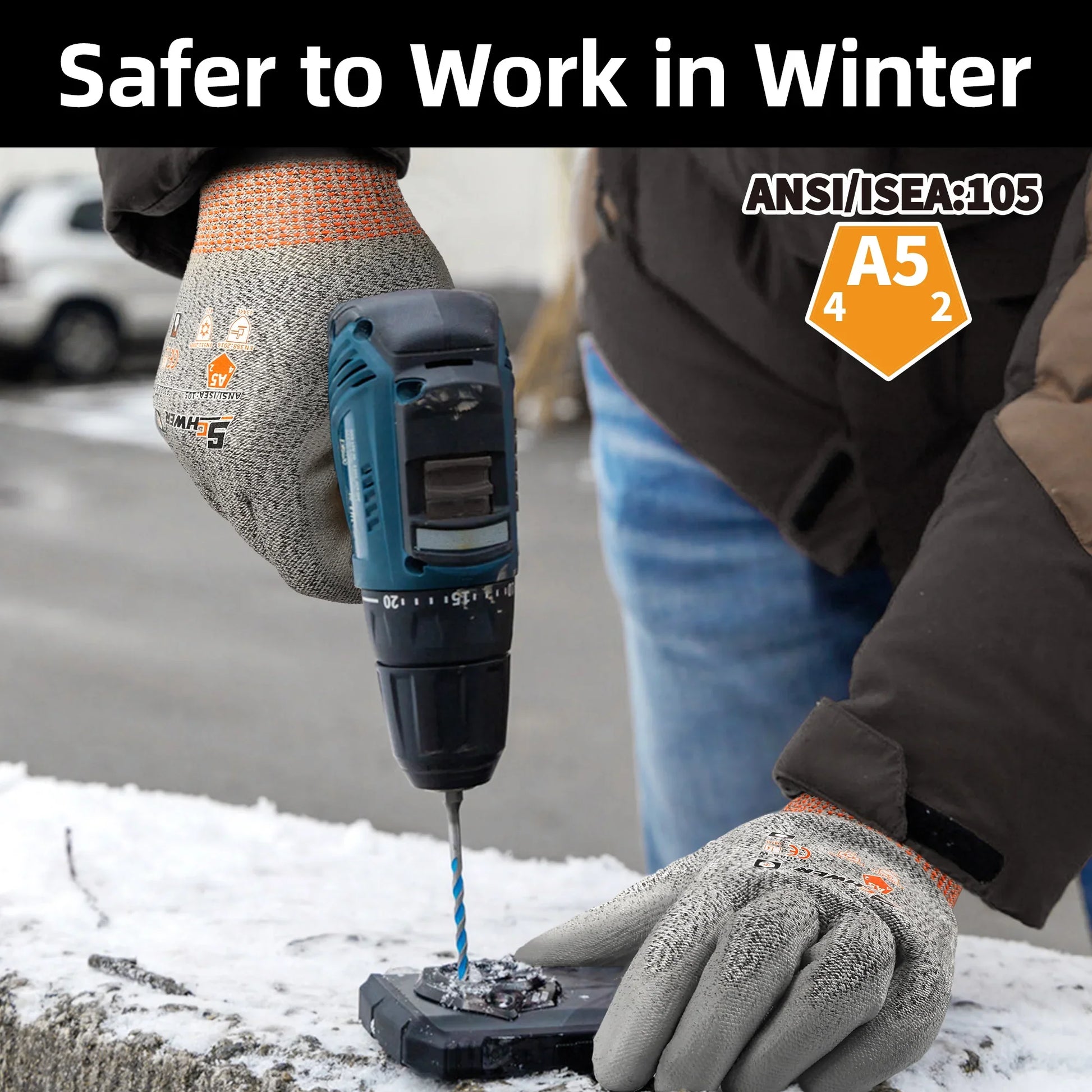 Worker wearing ANSI A5 cut-resistant gloves using drill on snowy outdoor surface for winter safety