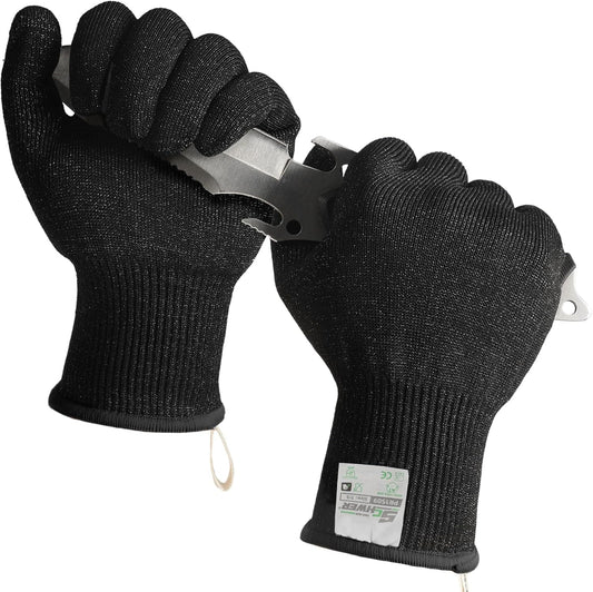 Pair of black cut-resistant gloves holding a serrated metal knife blade, safety gear
