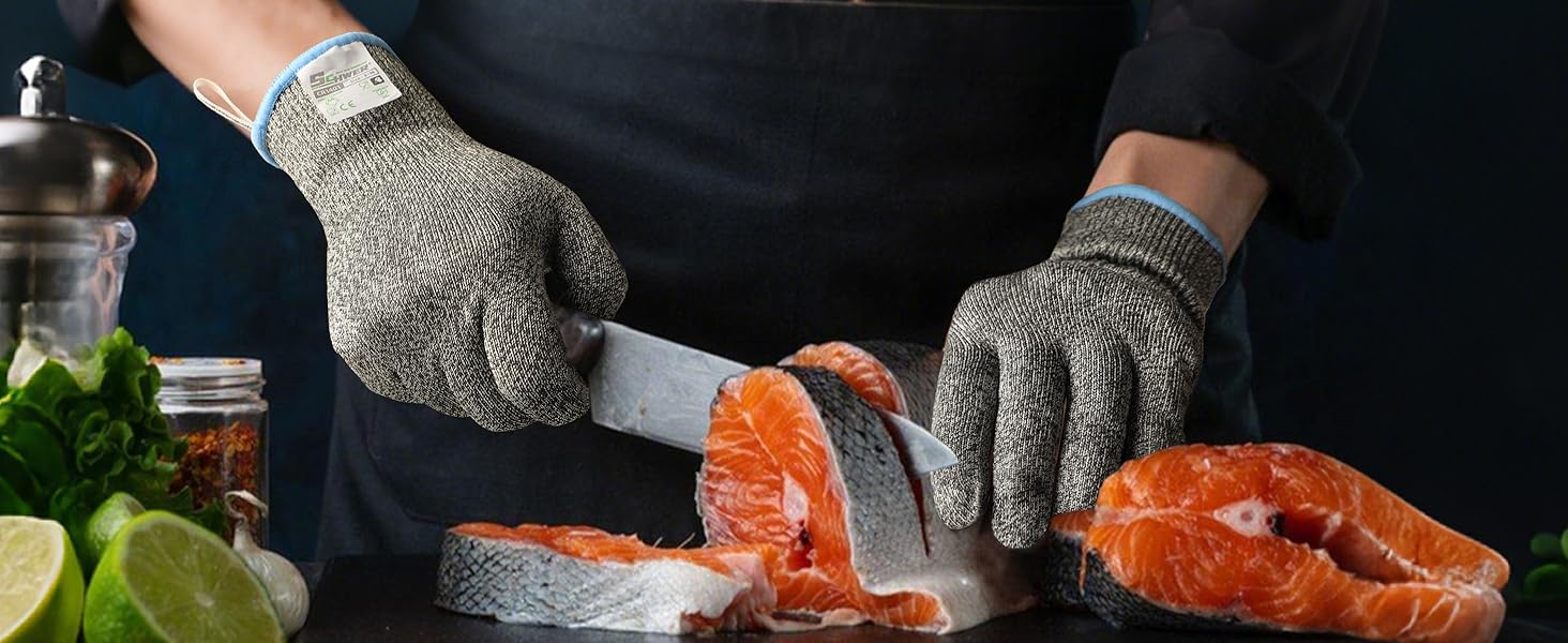 Person filleting salmon with gloves on a cutting board, surrounded by ingredients.