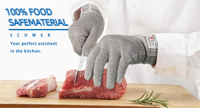 Person cutting raw meat with gloves on a wooden board, promoting food-safe material gloves.