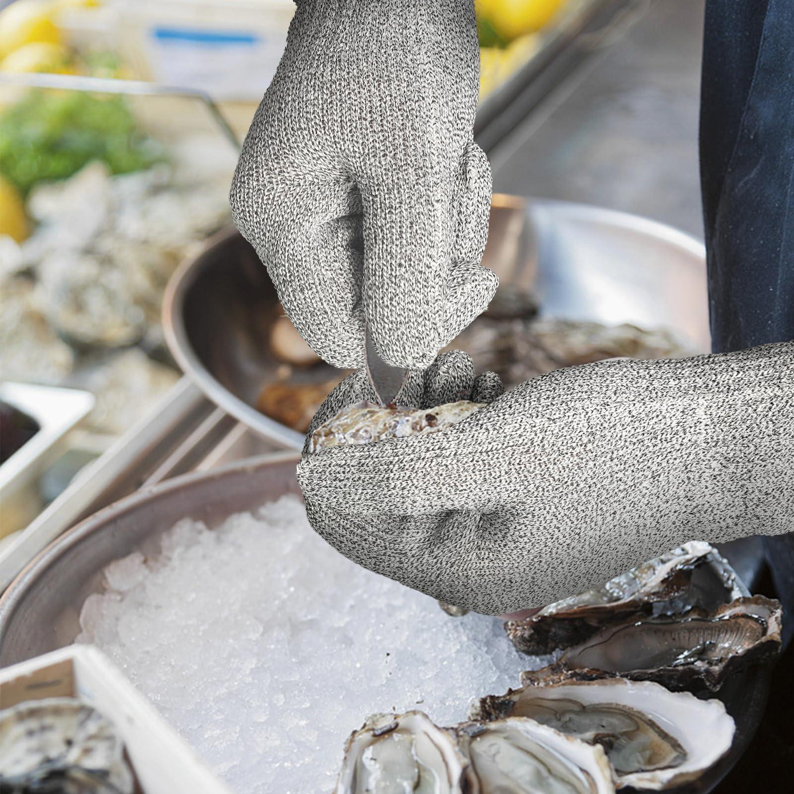 Person wearing cut-resistant gloves shucking fresh oysters on ice at seafood market