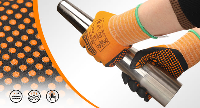 Hand wearing an orange and black glove holding a metal tool against a textured orange and black background.