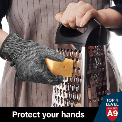 Person wearing cut-resistant glove grating cheese with metal box grater