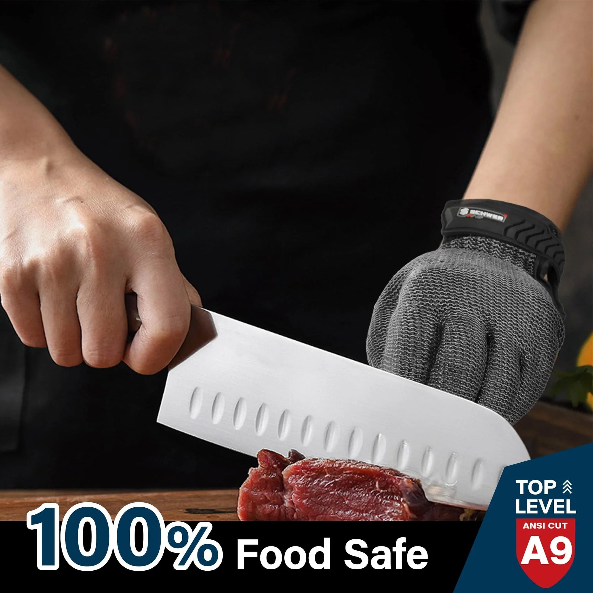 Hand wearing cut-resistant glove slicing raw meat with a chef knife on wooden board