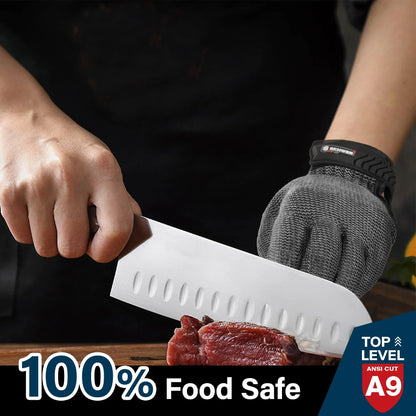 Hand wearing cut-resistant glove slicing raw meat with a chef knife on wooden board