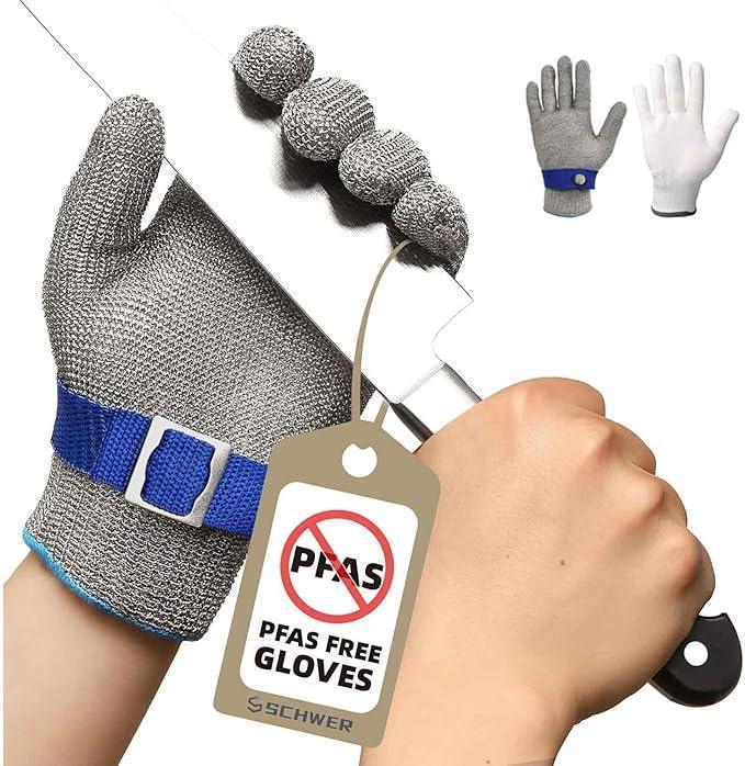 Metallic cut-resistant glove with a 'PFAS Free Gloves' tag, held by a hand.