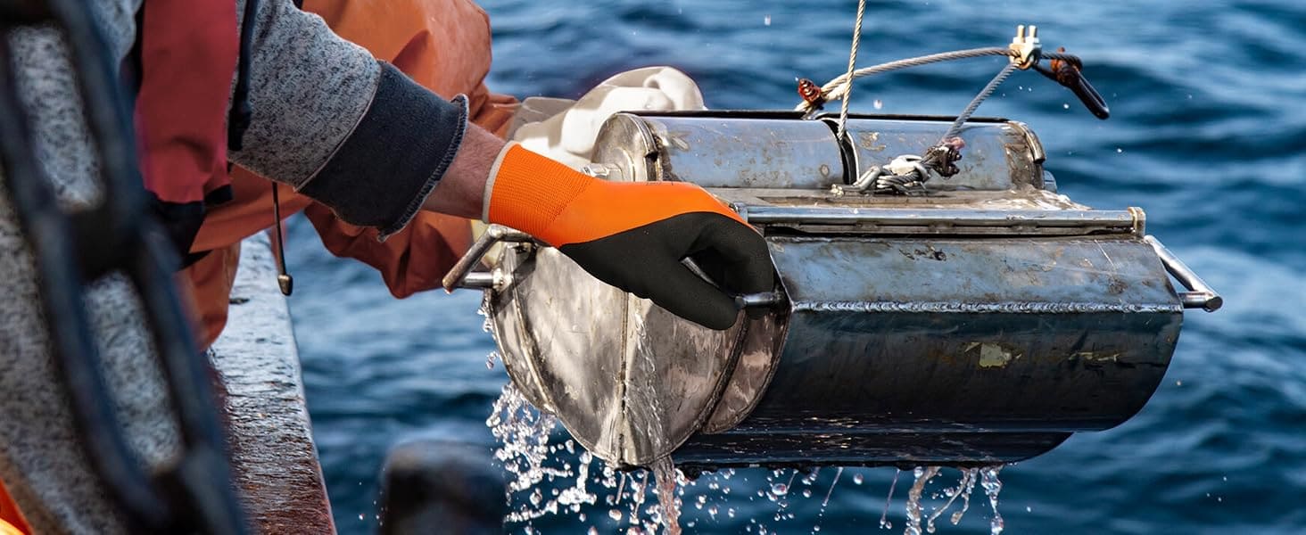 Person cleaning a fish with water splashing around, against a blue water background