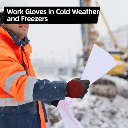 Worker in snow wearing orange reflective jacket and red insulated gloves holding paper plans